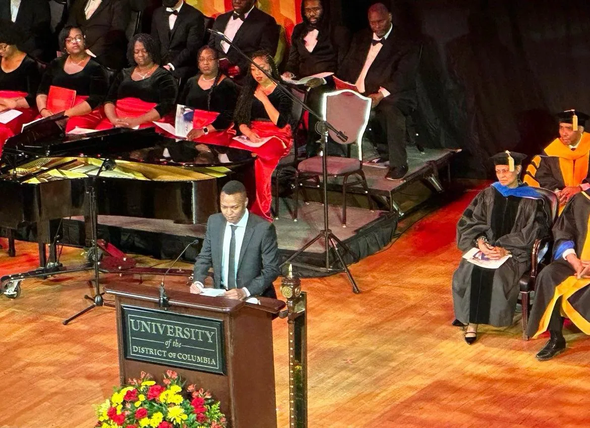 John Irungu speaking as Graduate Students Association President